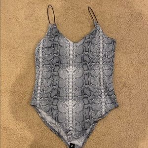 Snake print bodysuit w cable straps